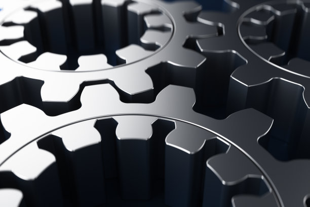 金属齿轮在蓝色背景上的特写。3d渲染图。图片下载