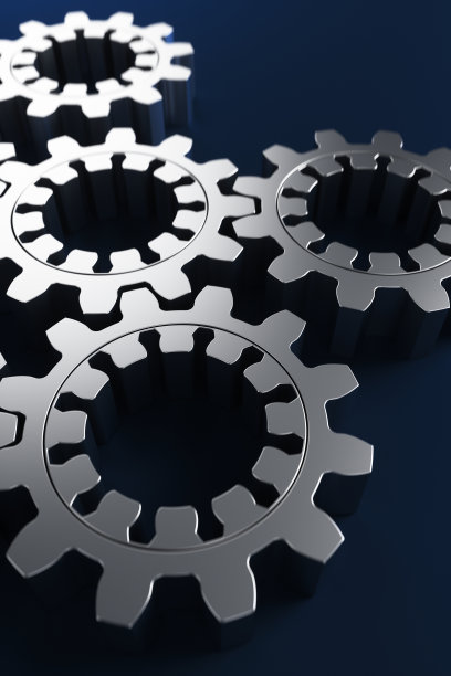 金属齿轮在蓝色背景上的特写。3d渲染图。图片下载