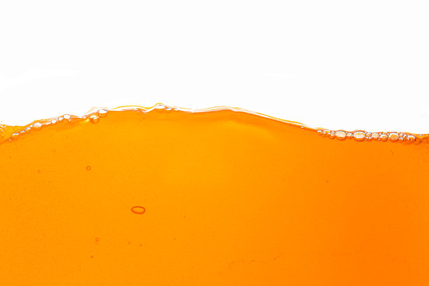 橙汁孤立的白色背景，橙汁纹理在白色背景上，拉近明亮的橙汁纹理，为健康和自然波浪图片下载