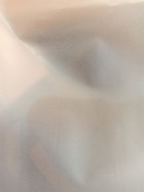 塑料袋表面为白色纹理背景图片下载