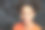 一个黑人少女站在教室的黑板旁，对着镜头微笑图片下载