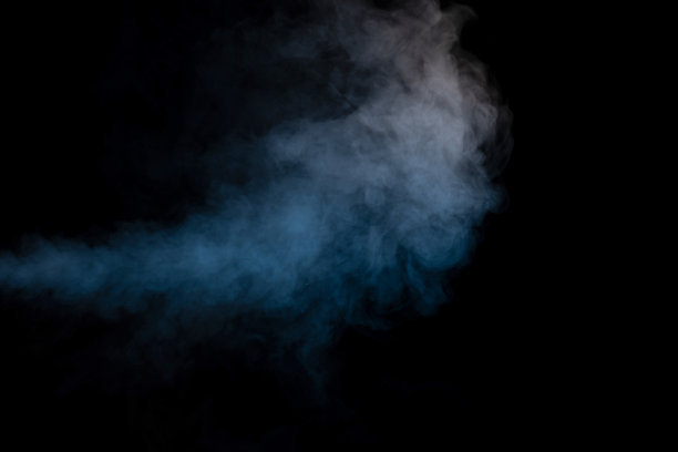 蓝色和黄色蒸汽在黑色的背景。图片下载