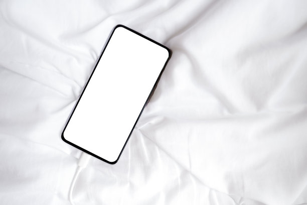 白色空白屏幕智能手机插入图片或广告文字在白色织物。剪切路径。副本的空间。图片下载
