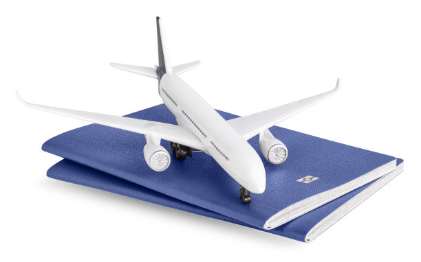 飞机和护照被隔离在白色背景上。图片下载