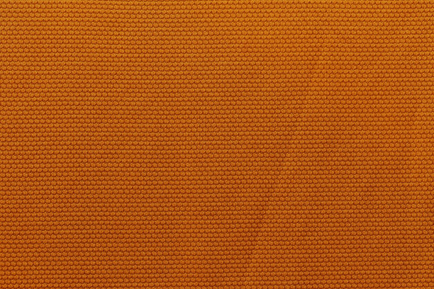橙色运动服装面料足球衫球衣纹理和纺织背景。图片下载