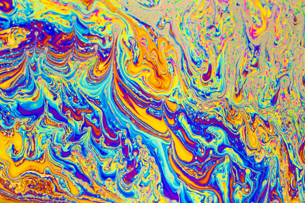 迷幻多色背景抽象。彩虹的颜色。模式的背景。肥皂泡的微距照片图片下载