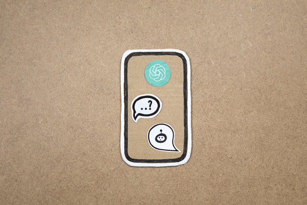 用纸做成的手机用机器人在语音泡泡上显示，概念上与机器人聊天。向AI提问。带有机器人代表的硬纸板智能手机准备工作了。图片下载