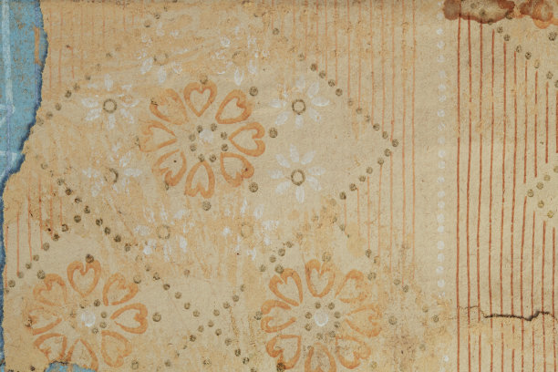 墙上的旧墙纸。旧的撕破的墙纸作为纹理或背景。图片下载