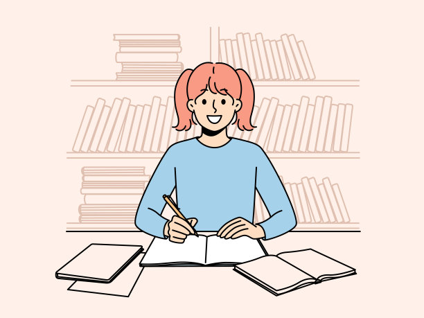 微笑的女孩坐在书桌前做作业图片下载