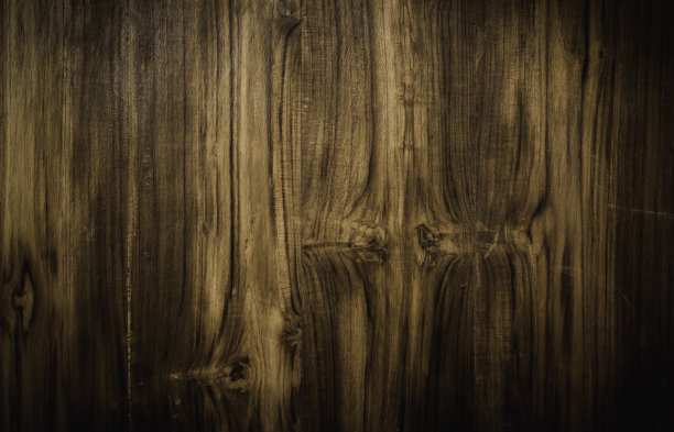 深棕色木材与黑色边框的背景，空间可用。图片下载