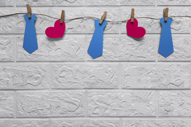 明亮欢快的装饰花环与领带和心为父亲节，生日，单身派对，情人节。图片下载