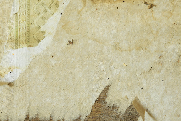 墙上的旧墙纸。旧的撕破的墙纸作为纹理或背景。图片下载