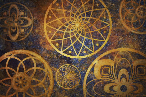 金色圆圈图案的抽象奇幻空间。艺术壁纸与深金和蓝色的颜色。图片下载