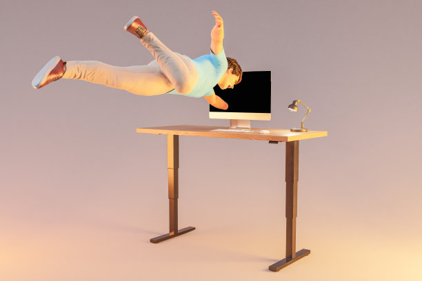 漂浮在空中的商人被吸进了电脑显示屏;超现实压力沉浸与虚拟现实概念;无限背景下孤立的办公桌;三维演示图片下载