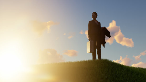 草地上的女商人图片下载