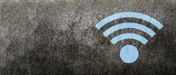 旧水泥墙背景上的Wifi图标图片下载