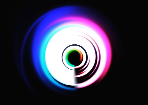 抽象的彩色光漩涡和黑色背景图片下载