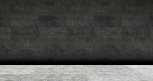 一个空荡荡的房间，灰色的墙壁和白色的光落在地板上图片下载