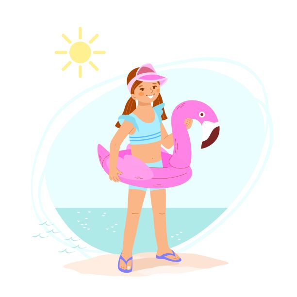 小女孩穿着沙滩泳衣，戴着遮阳帽站在海边，手里拿着一个粉红色火烈鸟形状的充气戒指。图片下载