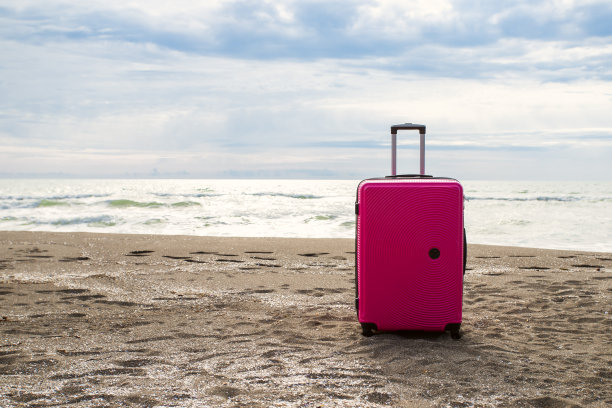 海边旅行箱，暑假，沙滩度假，旅游配件图片下载