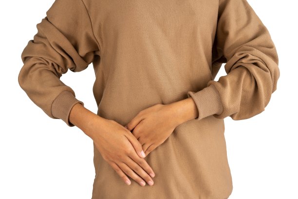 女子双手托着肾的腹部图片下载