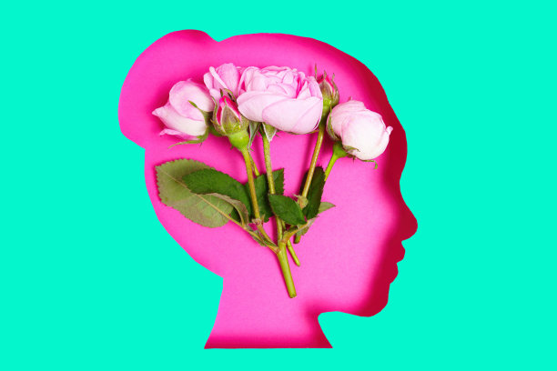 女性头部轮廓和新鲜的玫瑰在绿色图片下载