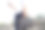 一名男子手持商务包使用手机的特写照片。图片下载