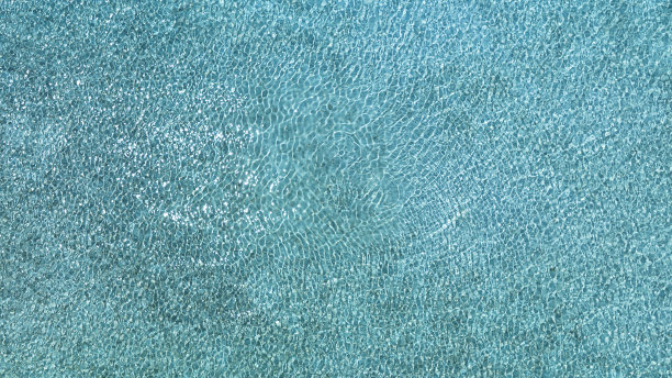 热带海滩水与清澈的海水在海滩的背景图片下载