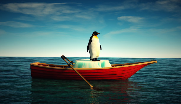 企鹅在冰川上坐着一条红色的船。全球变暖和自然灾害。图片下载