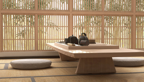 木制茶具台日本传统短腿桌，圆坐垫，黑色陶瓷茶壶，茶杯，阳光下的shoji窗图片下载
