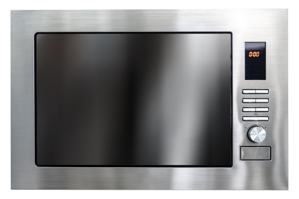 用于烹饪和加热或解冻食物的电微波炉的正面视图图片下载