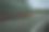黎明时分，一辆卡车行驶在高速公路上。高速公路上模糊的移动。早晨一辆卡车的照片。国际运输和物流的概念。图片下载
