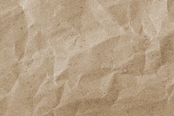 皱巴巴的棕色工艺纸，质地，自然背景图片下载