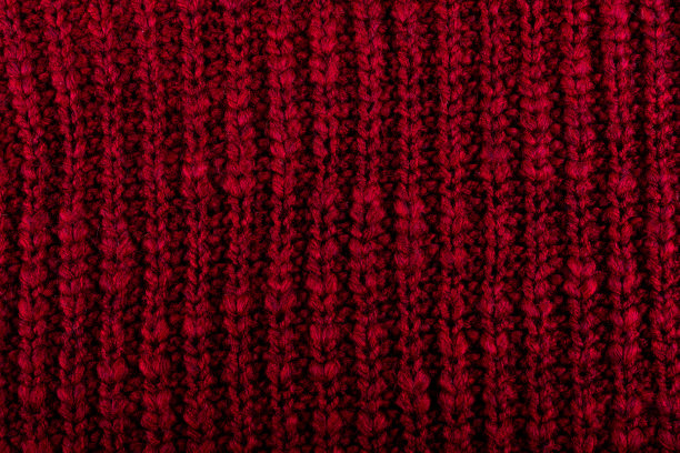 红色针织特写细节。背景和纹理。图片下载