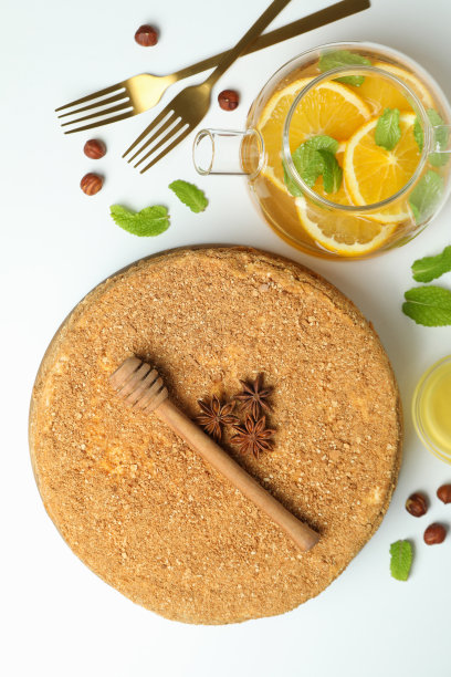 概念美味的甜点与蜂蜜蛋糕，俯视图图片下载