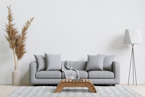 现代客厅有灰色的沙发，装饰植物，灯，和茶几。3 d渲染。图片下载