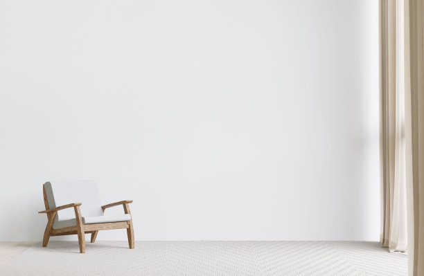 现代客厅，靠白墙放着一把扶手椅。3 d渲染。图片下载
