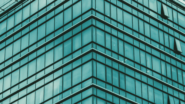 架构细节背景。摩天大楼外。复杂高层建筑的细节。玻璃幕墙建筑图片下载