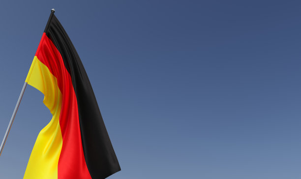 德国国旗插在蓝色背景的旗杆上。放文字的地方。旗帜在风中展开。德国,柏林。欧洲，3D插图。图片下载