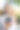 一个小女孩拿着智能手机和耳机坐在公园的长椅上。图片下载