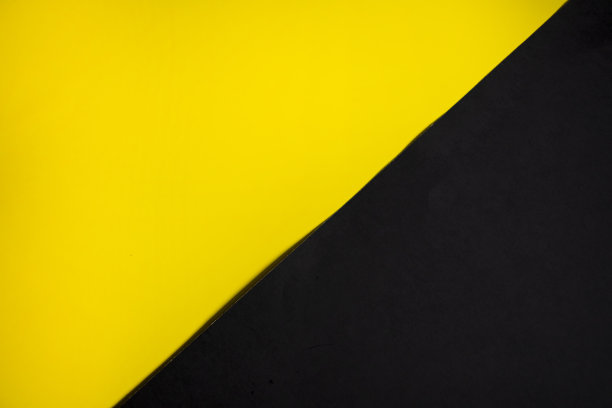 背景的黑色和黄色纸板股票照片图片下载