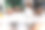 两个穿着黄色衣服的工程师在办公室的办公桌前与建筑工地的建筑项目讨论数据和笔记本电脑图片下载