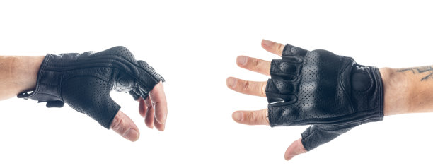 摩托车皮革无指手套在手上孤立的白色背景。图片下载