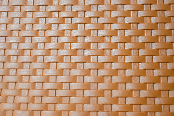 柳条塑料椅上的柳条图案的抽象背景。图片下载