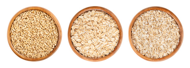 燕麦粒，燕麦片和燕麦片，普通燕麦，在木碗里图片下载
