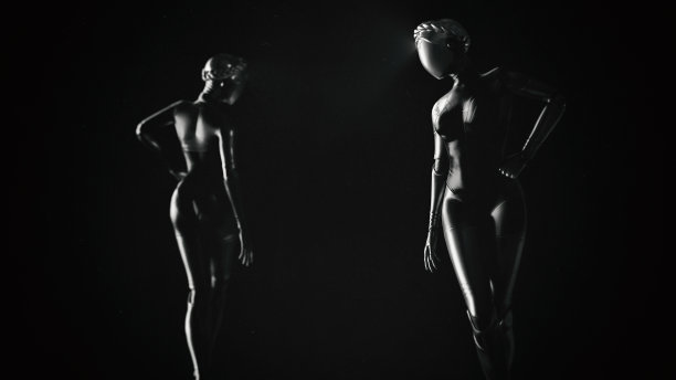 黑色背景上的两个女性机器人。图片下载