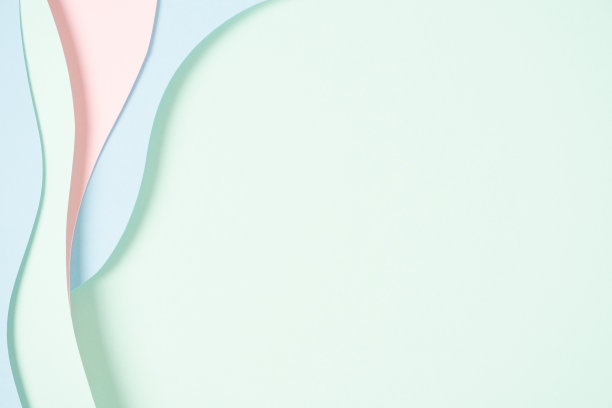 抽象的彩色纸纹理背景。最小的剪纸组成与层次几何形状和线条在柔和的绿色，粉红色和浅蓝色。俯视图，复制空间图片下载