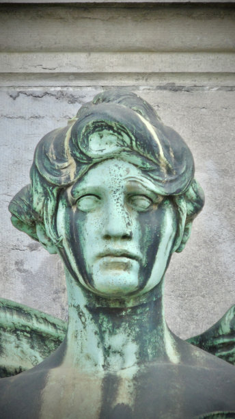 近距离观察“省的生活”的头部和脸部，这是范·德·斯塔彭的青铜雕像，装饰着比利时布鲁塞尔的五十周年纪念拱廊。图片下载