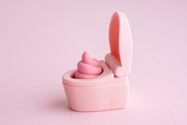 可爱的便便和粉红色的马桶图片下载