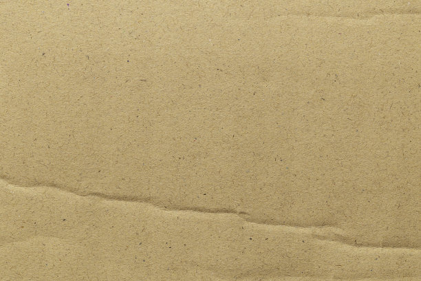 棕色生态再生牛皮纸片纹理纸板背景。图片下载